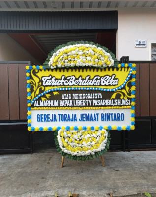Papan Bunga Duka di Asmat